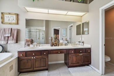 Stunning Former Model Home with Golf Course  Conservation Views on River Hills Country Club in Florida - for sale on GolfHomes.com, golf home, golf lot