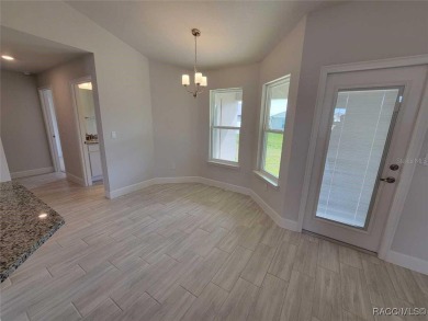 THIS HOME QUALIFIES FOR A LOW INTEREST RATE BUYDOWN WHEN BUYER on Citrus Springs Country Club in Florida - for sale on GolfHomes.com, golf home, golf lot