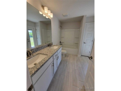 THIS HOME QUALIFIES FOR A LOW INTEREST RATE BUYDOWN WHEN BUYER on Citrus Springs Country Club in Florida - for sale on GolfHomes.com, golf home, golf lot