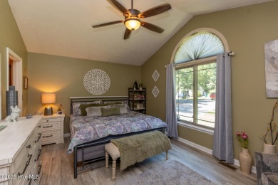 Charming home in the gated Woodlake community!  Situated on a on Woodlake Country Club in North Carolina - for sale on GolfHomes.com, golf home, golf lot