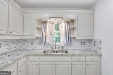 This charming 3-bedroom, 2-bath, 4-sided brick ranch in on Browns Mill Golf Course in Georgia - for sale on GolfHomes.com, golf home, golf lot