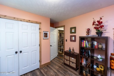 Charming home in the gated Woodlake community!  Situated on a on Woodlake Country Club in North Carolina - for sale on GolfHomes.com, golf home, golf lot