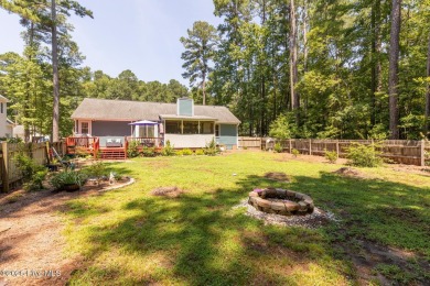 Charming home in the gated Woodlake community!  Situated on a on Woodlake Country Club in North Carolina - for sale on GolfHomes.com, golf home, golf lot