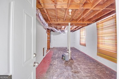 This charming 3-bedroom, 2-bath, 4-sided brick ranch in on Browns Mill Golf Course in Georgia - for sale on GolfHomes.com, golf home, golf lot