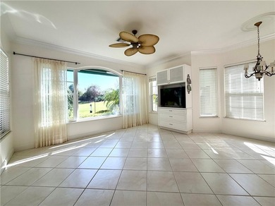 Sunny Oak Harbor Home on 4th fairway w/ an elevated terrace on Oak Harbor Country Club in Florida - for sale on GolfHomes.com, golf home, golf lot