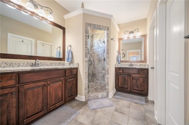 Experience effortless luxury living in this stunning reverse 1 on Staley Farms Golf Club in Missouri - for sale on GolfHomes.com, golf home, golf lot