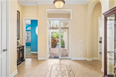 Beautiful Ashley Model on a Private, lushly landscaped South on Oak Harbor Country Club in Florida - for sale on GolfHomes.com, golf home, golf lot