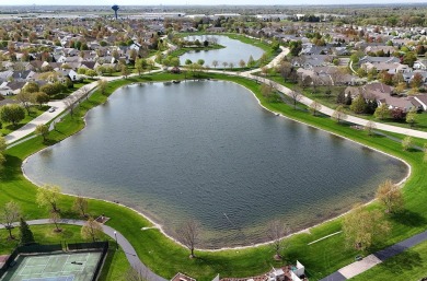 This isn't just a house, it's your ticket to the good life! on Carillon Lakes 3 Hole Course in Illinois - for sale on GolfHomes.com, golf home, golf lot