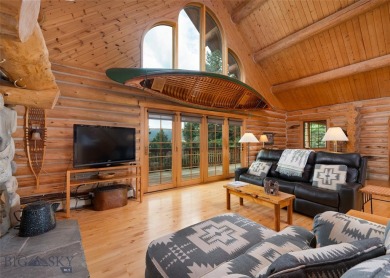 This charming log home, nestled in the trees and perched above on Big Sky of Montana Golf Course in Montana - for sale on GolfHomes.com, golf home, golf lot