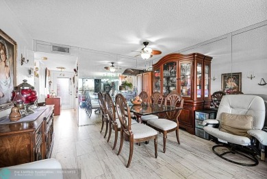 Welcome to this unique 2-bedroom, 2-bathroom corner unit on the on Sunrise Lakes Phase IV Golf Course in Florida - for sale on GolfHomes.com, golf home, golf lot