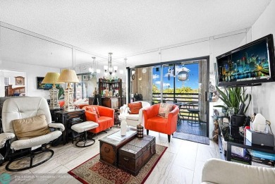 Welcome to this unique 2-bedroom, 2-bathroom corner unit on the on Sunrise Lakes Phase IV Golf Course in Florida - for sale on GolfHomes.com, golf home, golf lot