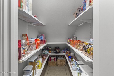 Welcome to your dream home, nestled on the 17th hole of on Colonial Country Club Deerfield in Mississippi - for sale on GolfHomes.com, golf home, golf lot