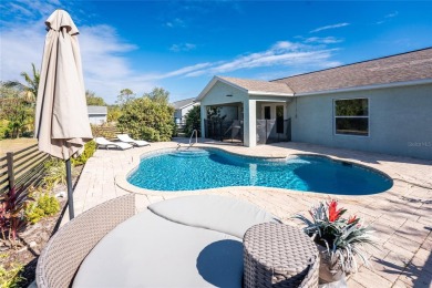 Step into your own slice of paradise with this TURNKEY FURNISHED on Riverwood Golf Club in Florida - for sale on GolfHomes.com, golf home, golf lot