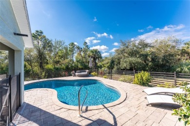 Step into your own slice of paradise with this TURNKEY FURNISHED on Riverwood Golf Club in Florida - for sale on GolfHomes.com, golf home, golf lot