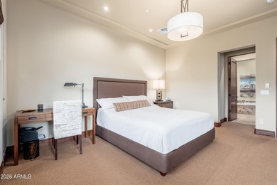 Sophisticated lock-and-leave living in an amenity-rich enclave on The Country Club At DC Ranch in Arizona - for sale on GolfHomes.com, golf home, golf lot