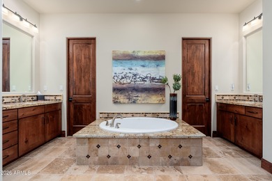 Sophisticated lock-and-leave living in an amenity-rich enclave on The Country Club At DC Ranch in Arizona - for sale on GolfHomes.com, golf home, golf lot