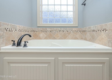 Welcome home to 890 Willow Grande Cir in Castlewoods of Brandon on Castlewoods Golf Club in Mississippi - for sale on GolfHomes.com, golf home, golf lot