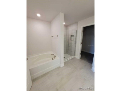 THIS HOME QUALIFIES FOR A LOW INTEREST RATE BUYDOWN WHEN BUYER on Citrus Springs Country Club in Florida - for sale on GolfHomes.com, golf home, golf lot