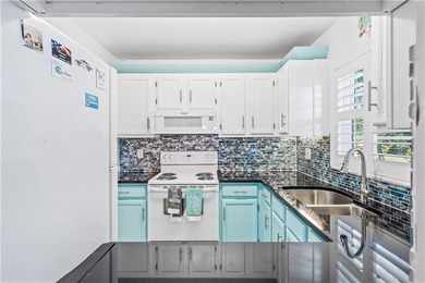 Enjoy Florida living in this gorgeous modern 2-bed, 2-bath 2nd on The American Golf Club in Florida - for sale on GolfHomes.com, golf home, golf lot