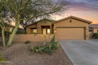 Single-level home with a Large courtyard at the entrance and an on Estrella Mountain Ranch Golf Course in Arizona - for sale on GolfHomes.com, golf home, golf lot