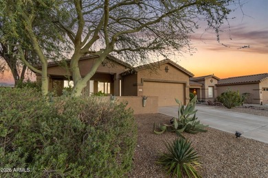 Single-level home with a Large courtyard at the entrance and an on Estrella Mountain Ranch Golf Course in Arizona - for sale on GolfHomes.com, golf home, golf lot