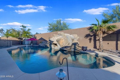 Single-level home with a Large courtyard at the entrance and an on Estrella Mountain Ranch Golf Course in Arizona - for sale on GolfHomes.com, golf home, golf lot