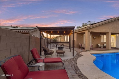 Single-level home with a Large courtyard at the entrance and an on Estrella Mountain Ranch Golf Course in Arizona - for sale on GolfHomes.com, golf home, golf lot