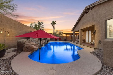 Single-level home with a Large courtyard at the entrance and an on Estrella Mountain Ranch Golf Course in Arizona - for sale on GolfHomes.com, golf home, golf lot