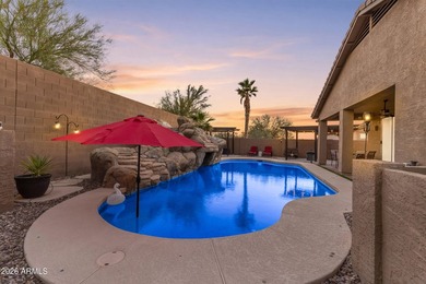 Single-level home with a Large courtyard at the entrance and an on Estrella Mountain Ranch Golf Course in Arizona - for sale on GolfHomes.com, golf home, golf lot
