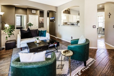 Step into a home that instantly wraps you in warmth. Morning on Seville Golf and Country Club in Arizona - for sale on GolfHomes.com, golf home, golf lot