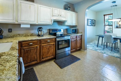 Step into a home that instantly wraps you in warmth. Morning on Seville Golf and Country Club in Arizona - for sale on GolfHomes.com, golf home, golf lot