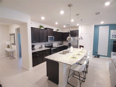 Professionally Designed, Fully Furnished 5-Bedroom Townhome in on Polo Park East in Florida - for sale on GolfHomes.com, golf home, golf lot