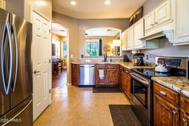 Step into a home that instantly wraps you in warmth. Morning on Seville Golf and Country Club in Arizona - for sale on GolfHomes.com, golf home, golf lot