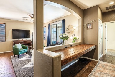 Step into a home that instantly wraps you in warmth. Morning on Seville Golf and Country Club in Arizona - for sale on GolfHomes.com, golf home, golf lot