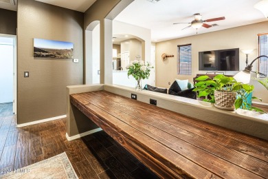 Step into a home that instantly wraps you in warmth. Morning on Seville Golf and Country Club in Arizona - for sale on GolfHomes.com, golf home, golf lot