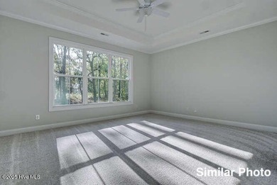 The Otter by American Homesmith offers easy, coastal living in on Lennon Hills Golf Course in North Carolina - for sale on GolfHomes.com, golf home, golf lot