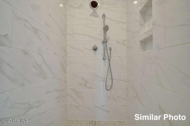 The Otter by American Homesmith offers easy, coastal living in on Lennon Hills Golf Course in North Carolina - for sale on GolfHomes.com, golf home, golf lot