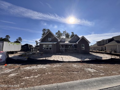 The Otter by American Homesmith offers easy, coastal living in on Lennon Hills Golf Course in North Carolina - for sale on GolfHomes.com, golf home, golf lot