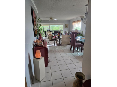 Top floor Penthouse corner Magnolia unit. On the lake in one of on Flamingo Lakes Country Club in Florida - for sale on GolfHomes.com, golf home, golf lot