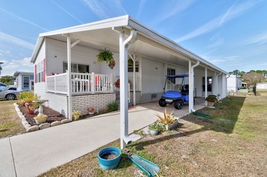 So so CUTE and SUPER Clean. ROOF & AC: 2018. Enjoy this adorable on Barefoot Bay Golf Course in Florida - for sale on GolfHomes.com, golf home, golf lot
