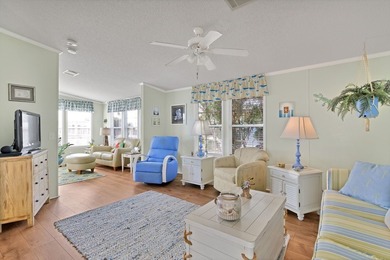So so CUTE and SUPER Clean. ROOF & AC: 2018. Enjoy this adorable on Barefoot Bay Golf Course in Florida - for sale on GolfHomes.com, golf home, golf lot