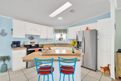 So so CUTE and SUPER Clean. ROOF & AC: 2018. Enjoy this adorable on Barefoot Bay Golf Course in Florida - for sale on GolfHomes.com, golf home, golf lot