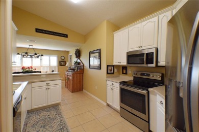 Welcome to this spacious 3-bedroom, 2-bath home offers scenic on Tampa Bay Golf and Country Club in Florida - for sale on GolfHomes.com, golf home, golf lot