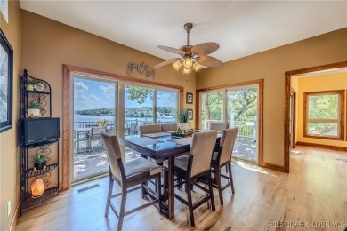 Discover your dream lakefront retreat! This stunning 5,700 sq ft on Bayview Golf Course in Missouri - for sale on GolfHomes.com, golf home, golf lot