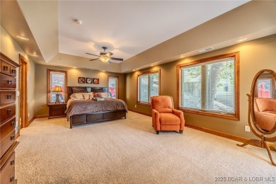 Discover your dream lakefront retreat! This stunning 5,700 sq ft on Bayview Golf Course in Missouri - for sale on GolfHomes.com, golf home, golf lot