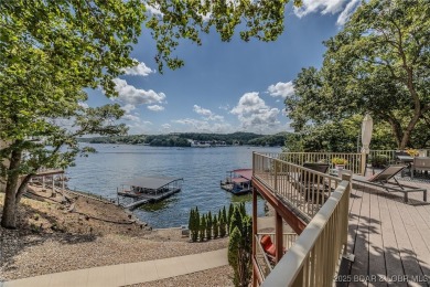 Discover your dream lakefront retreat! This stunning 5,700 sq ft on Bayview Golf Course in Missouri - for sale on GolfHomes.com, golf home, golf lot