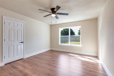 This beautifully renovated 2-bedroom, 2-bathroom home is located on Eagle Mountain Country Club  in Texas - for sale on GolfHomes.com, golf home, golf lot