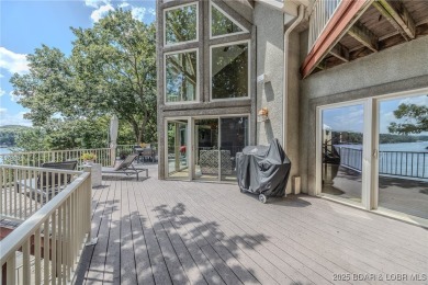 Discover your dream lakefront retreat! This stunning 5,700 sq ft on Bayview Golf Course in Missouri - for sale on GolfHomes.com, golf home, golf lot
