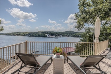 Discover your dream lakefront retreat! This stunning 5,700 sq ft on Bayview Golf Course in Missouri - for sale on GolfHomes.com, golf home, golf lot