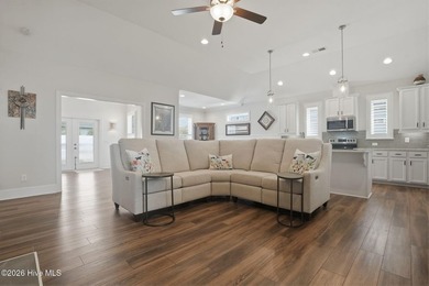 Coastal Charm Awaits You in Ocean Isle Beach. Sunset Ridge is on Ocean Ridge Plantation in North Carolina - for sale on GolfHomes.com, golf home, golf lot